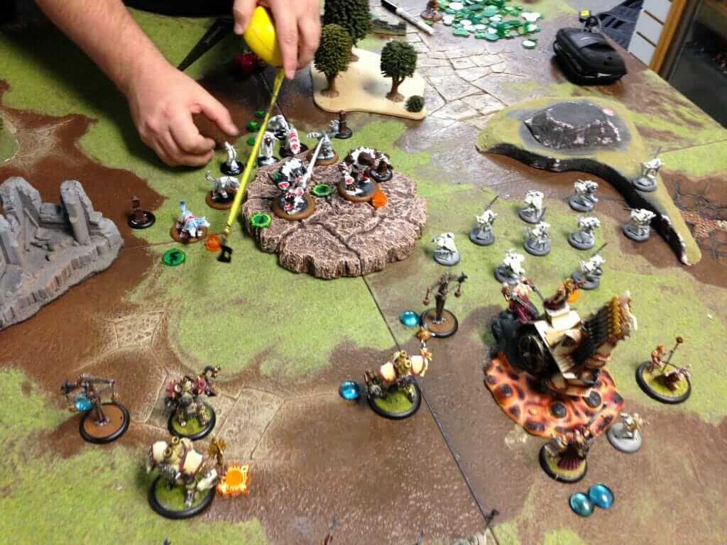 AI Enhanced Wargaming and Tabletop RPGs (Tips and Uses) - A game of Warmachine Hordes ongoing top-down view