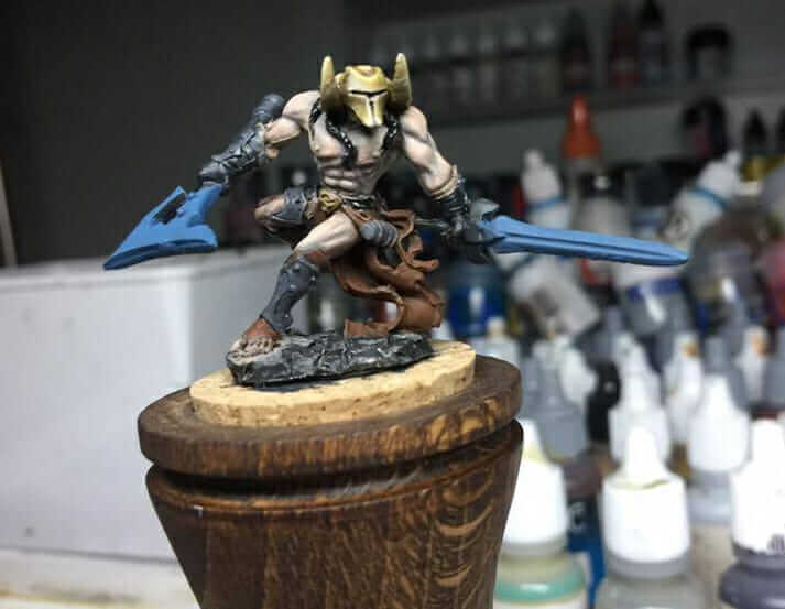 3 ways to use dry brushing on miniatures - a reaper barbarian miniature painted to a high quality