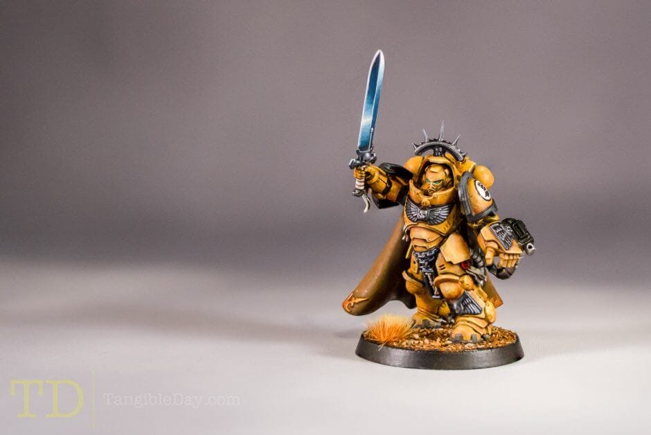 painting and practicing nmm - a blue power sword on a warhammer 40k space marine