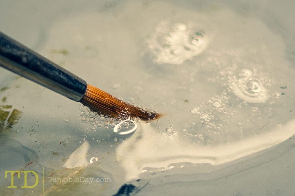 Saliva for brush care and maintenance