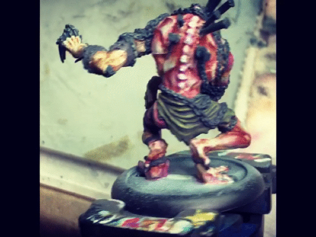 GW Citadel Painting Handle (Full Review) - Citadel Paint Handle Review: Is It Worth It? - Citadel Painting Handle Review - firm grip of miniature GIF file