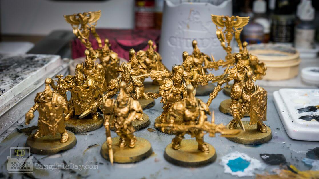 Retributor Armour: Best Gold Metallic Paint? - close up of adeptus custodes miniatures on tabletop 