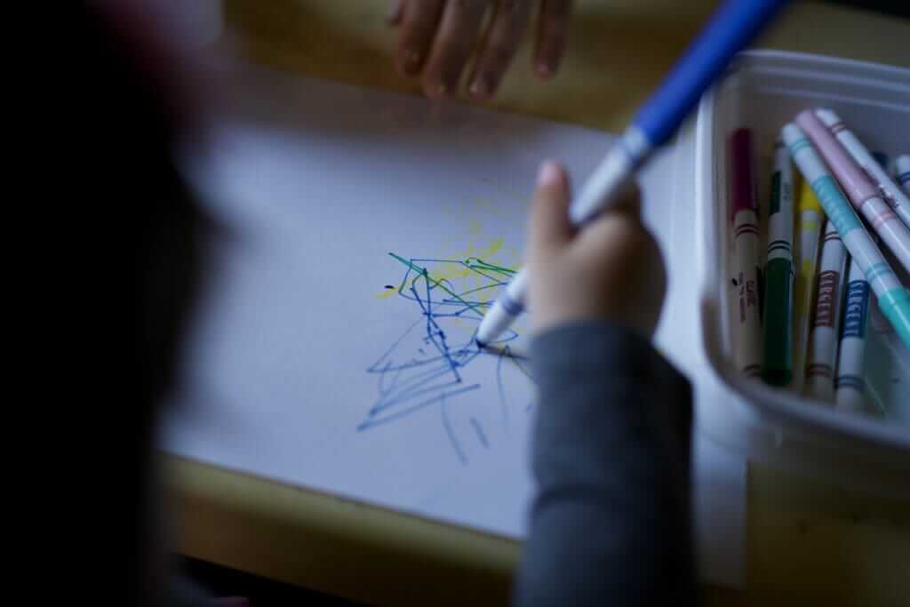 Overcoming the Blank Page (About Why I Write) - my daughter doodling with a magic marker