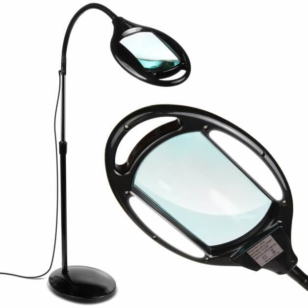 Floor-standing magnifying lamp with rectangular glass lens and flexible arm
