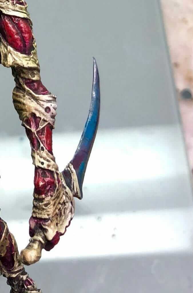 Thick or thin superglue for miniatures? Best superglue for miniatures models - close up of miniature painted skin