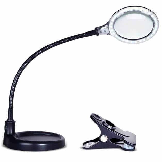 Clamp-on LED magnifying lamp with glass lens and swing arm
