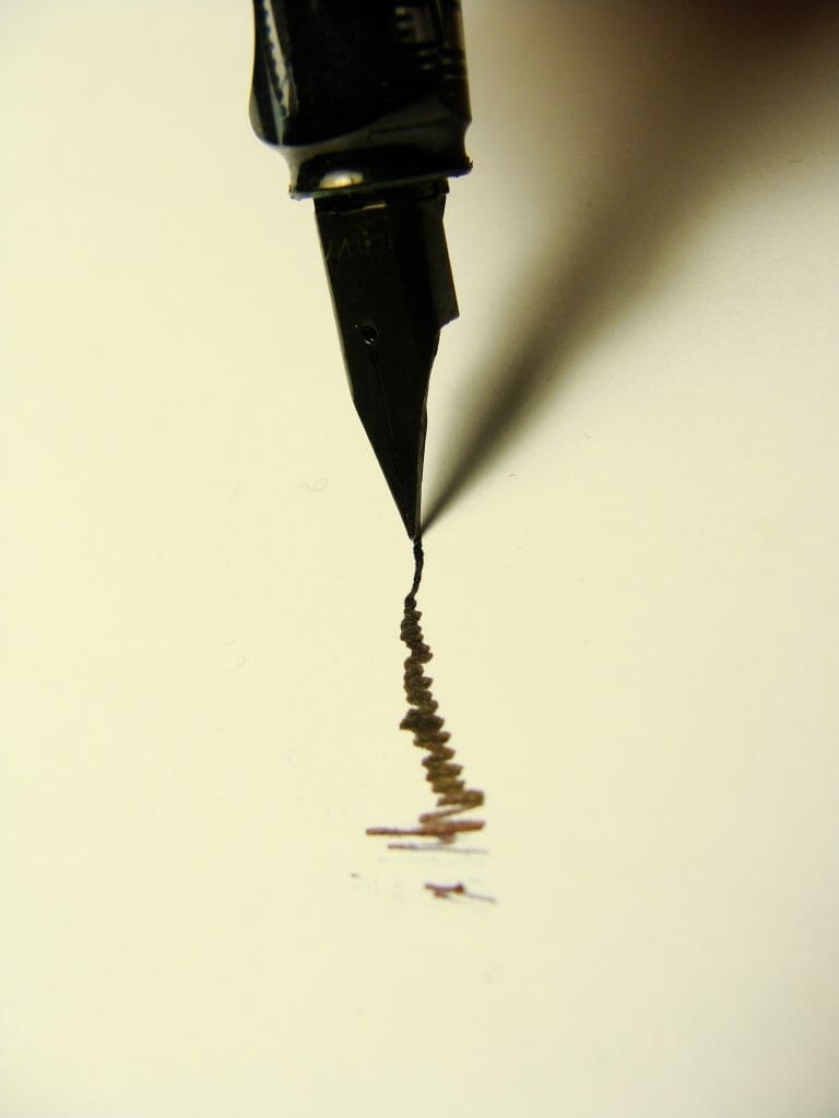 Exhausted by Your Hobbies? Hobby life burnout a journal passage - a black fountain pen with black ink on parchment paper