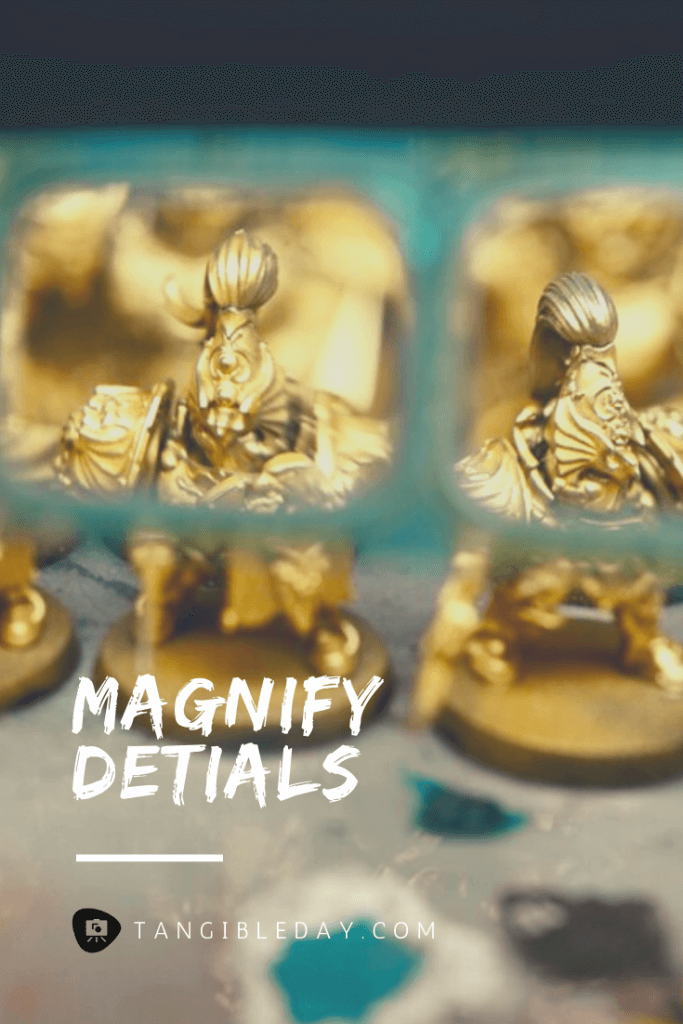 Illustration showing how magnification helps painters see miniature details clearly