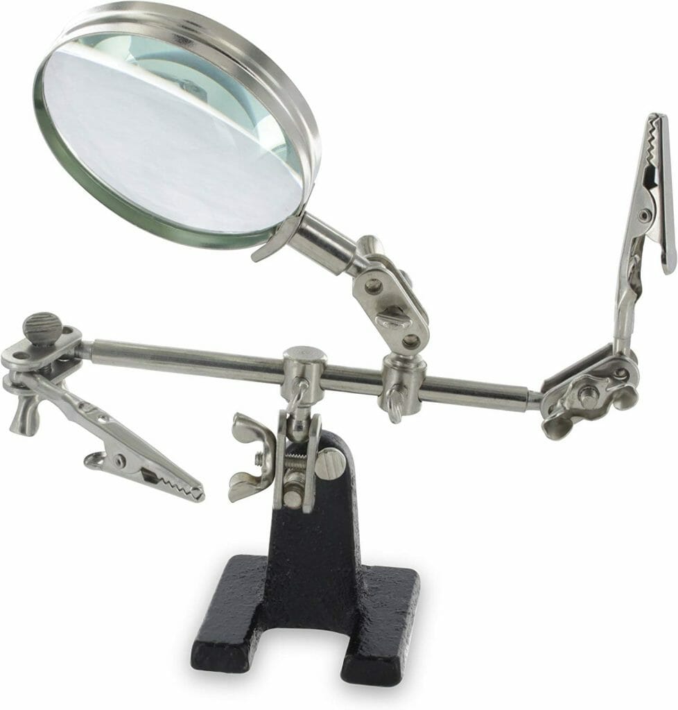 am-Pro helping hands tool with magnifying glass and adjustable alligator clips on a metal stand, ideal for hobbyist work