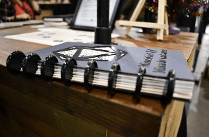 7 Cool Tabletop Gaming Products Showcased at Pax Unplugged - Unique RPG gaming swag and accessories - Mischief & Misadventure Campaign Planner (Gaming Journals) - dnd accessories - dungeons and dragons tabletop roleplaying