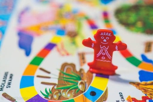 Is Candy Land the "Reality" Game? - deconstructing candy land. Candy land the adult game for kids at heart - red playing marker close up