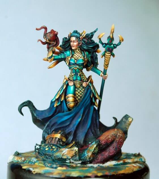 How to paint miniatures competitively – how to paint for competition – painting contest – how to win a painting contest – Marike Reimer miniature painting – interview with Marike Reimer about the Kraken Mistress – how to paint miniatures like a pro – how to paint miniatures professionally – best miniature painting tutorials – how to paint NMM gold