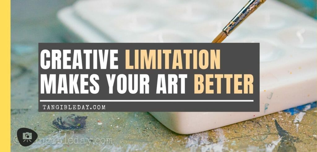 A paintbrush with paint palette in the background, showcasing the concept of creative limitation in art.