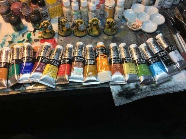 Best oil paints for miniatures and models - how to use oil paints for painting minis - miniature painting oils - painting miniatures with oil - best oil paint for miniature painting - oil paint collection on my desk - water mixable oil paints for miniatures
