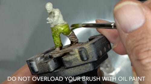 Painting a zombie RPG miniature with oil paints - painting RPG miniatures - oil painting miniatures - origin miniatures - how to paint rpg miniatures - how to paint dungeon and dragons miniatures - painting miniatures and models for role playing games - oil painting 28mm miniatures - do not overload brush