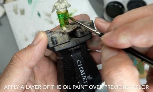 Painting a zombie RPG miniature with oil paints - painting RPG miniatures - oil painting miniatures - origin miniatures - how to paint rpg miniatures - how to paint dungeon and dragons miniatures - painting miniatures and models for role playing games - oil painting 28mm miniatures - thin layers of color