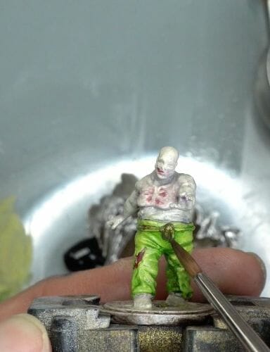 Painting a zombie RPG miniature with oil paints - painting RPG miniatures - oil painting miniatures - origin miniatures - how to paint rpg miniatures - how to paint dungeon and dragons miniatures - painting miniatures and models for role playing games - oil painting 28mm miniatures - paint details with oil