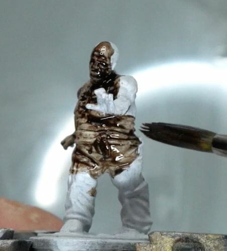 Painting a zombie RPG miniature with oil paints - painting RPG miniatures - oil painting miniatures - origin miniatures - how to paint rpg miniatures - how to paint dungeon and dragons miniatures - painting miniatures and models for role playing games - oil painting 28mm miniatures - even coats of oil paint
