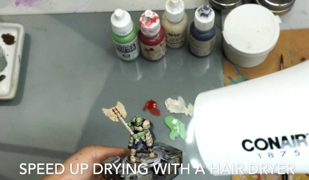 Speed painting tabletop miniatures - How to speed paint RPG miniatures and models - painting bulk dnd miniatures - how to paint models faster for tabletop games - 5 easy steps for painting miniatures fast - use a hair dryer to speed up your miniature painting