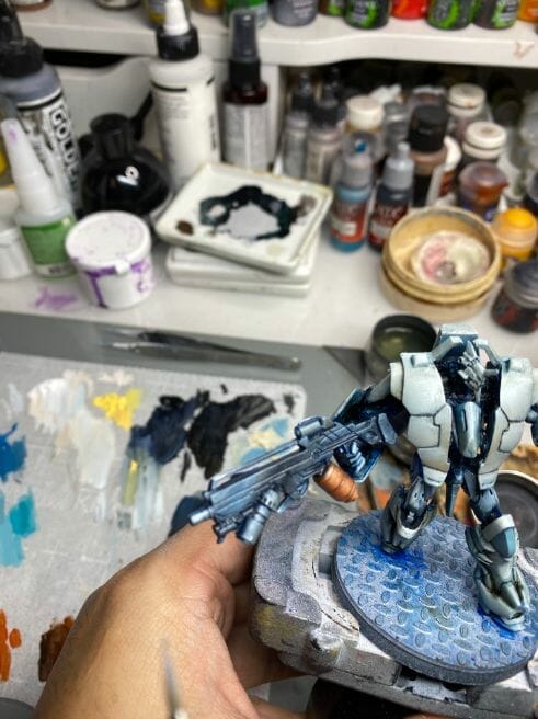 Oil Painting Tutorial for an Infinity Miniature (Step-by-Step) - Infinity miniature painting tutorial - how to paint infinity miniature TAG - painting a TAG model - panoceania miniature painting - infinity gradient paint technique - blending oil paint - Jotum miniature - blending highlights on rifle