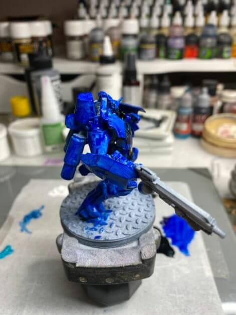 Oil Painting Tutorial for an Infinity Miniature (Step-by-Step) - Infinity miniature painting tutorial - how to paint infinity miniature TAG - painting a TAG model - panoceania miniature painting - infinity gradient paint technique - blending oil paint - Jotum miniature - pre glaze blue