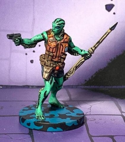 painting comic book miniatures - how to paint comic style miniatures - cel shaded miniature painting – how to paint cel shaded miniature – cell shaded miniature painting – miniature painting styles – how to paint cell shaded – borderlands miniature painting style – comic style painting - abe sapien hellboy miniature