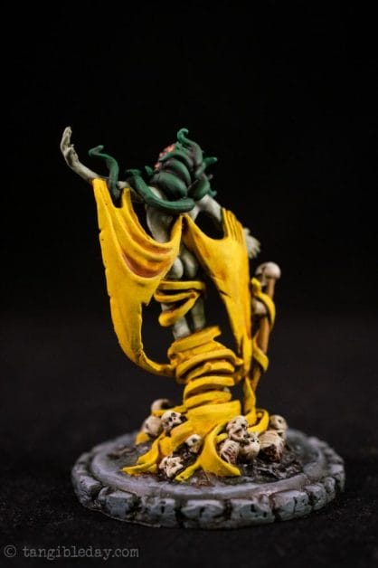 How to paint yellow models – shading yellow miniatures – painting yellow miniatures – painting board game miniatures – Cthulhu wars painting – Petersen Games - how to shade yellow minis – how to paint yellow minis and models – quick yellow painting – best yellow paint - back view studio photo