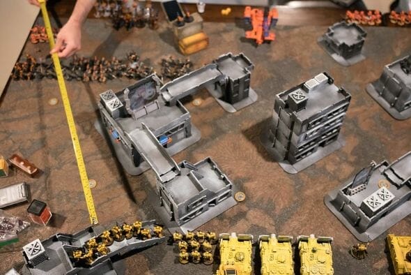 10 Great Wargaming Tables for RPGs and Tabletop Games - best game tables for RPGs - best wargaming table for warhammer - warhammer 40k game in progress