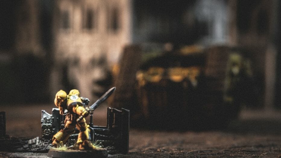 Warhammer 40k JoyToy Action Figure Review - Miniature photography of a space marine facing off against a tank, close up realistic imagery