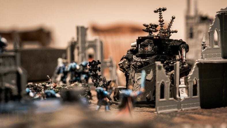Is Warhammer 40K Worth It? Why You Need to Play Warhammer 40k - Is Warhammer 40k expensive? - Should I start playing warhammer 40000 - why you should play WH40k - ork gargant in a tabletop game of warhammer 40k