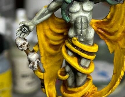 3 Best Things You Can Do With a Wet Palette - what a wet palette is best for - close up the king in yellow how to shade yellow paint
