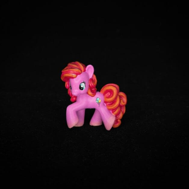 How to repaint dolls - how to repaint toy dolls - my little pony repainting - tutorial to repaint toys and dolls - my little pony pinkie pie custom painting - final studio photo of pinkie pie repainted