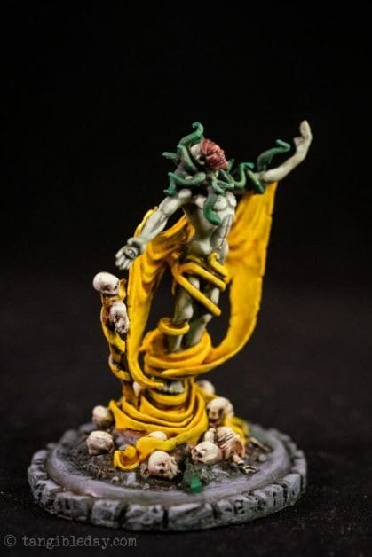 How to paint yellow models – shading yellow miniatures – painting yellow miniatures – painting board game miniatures – Cthulhu wars painting – Petersen Games - how to shade yellow minis – how to paint yellow minis and models – quick yellow painting – best yellow paint - studio shot image