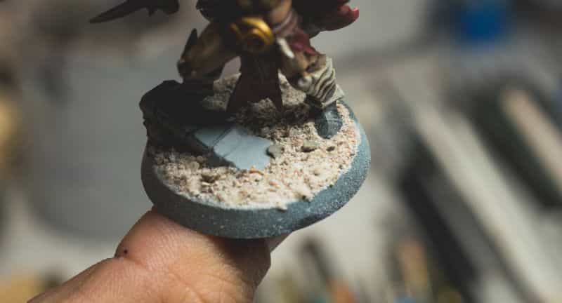 Basing Miniatures with Sand (Quick Method) - how to base miniatures with sand - sand basing models - realistic bases for miniatures - close up sand on base