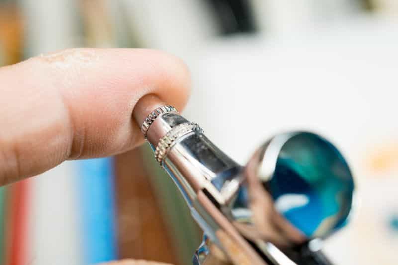 How to thin acrylic paint for airbrushes – how to thin paint for airbrushing miniatures and models –  What and how to thin hobby paint for your airbrush - stopping nose cone with finger to back flow air