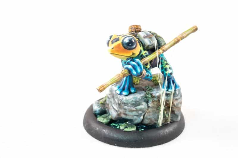 Three creative ways to use varnishes on painted miniatures - miniature painting varnish use - fun ways to use clear coat varnishes on miniatures and models - Frog painted miniature with swamp base