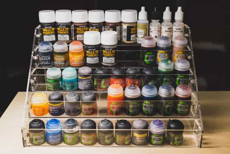 clear acrylic rack for storing paints and other hobby supplies