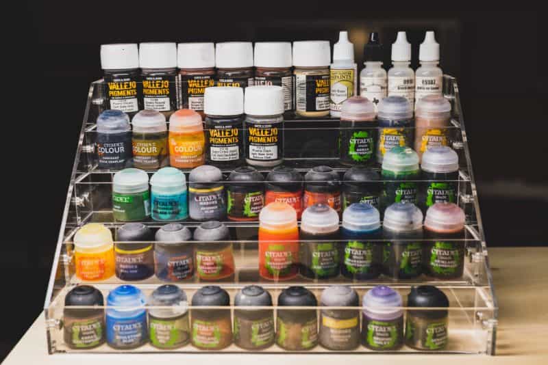 Miniature Painting Tips for Beginners - tips for beginner miniature painters - painting miniatures for beginners - miniature painting hobby acrylic colors on shelf