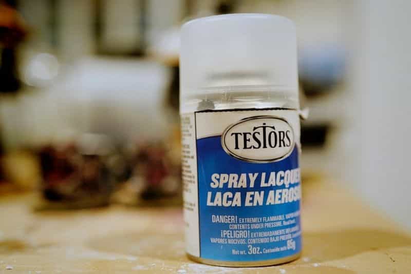 Three creative ways to use varnishes on painted miniatures - miniature painting varnish use - fun ways to use clear coat varnishes on miniatures and models - testors dullcote spray can up close