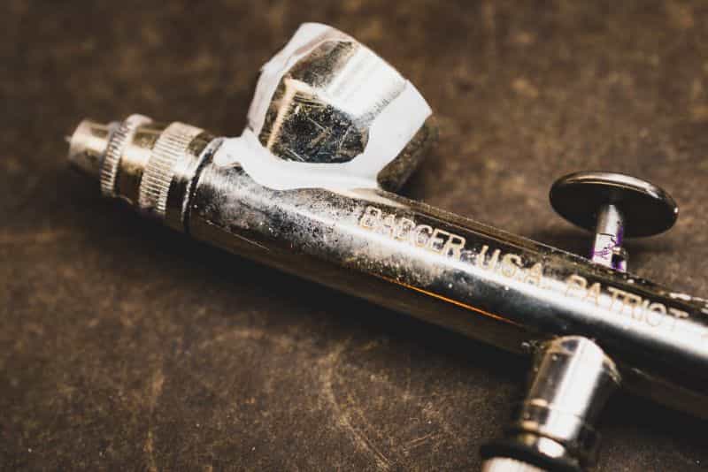 Badger Patriot 105 Airbrush Review (Full User Experience) - badger patriot 105 review - patriot airbrush review - Badger airbrush review for miniature painting - badger front logo