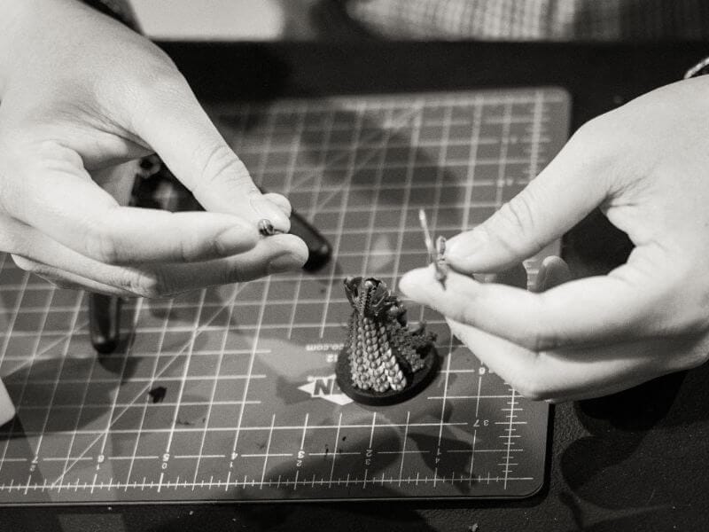 How Tabletop Miniature Gaming Can Help with PTSD - PTSD and tabletop games - wargames and PTSD - the benefits of tabletop games and boardgames for PTSD sufferers - assembling miniatures