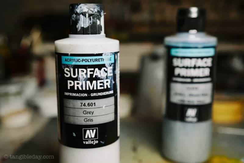 Top 10 Primers for Plastic and Metal Miniatures (Reviews and Tips) - Vallejo Surface Primer bottles