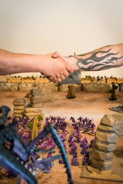 How Tabletop Miniature Gaming Can Help with PTSD - PTSD and tabletop games - wargames and PTSD - the benefits of tabletop games and boardgames for PTSD sufferers - end game handshake