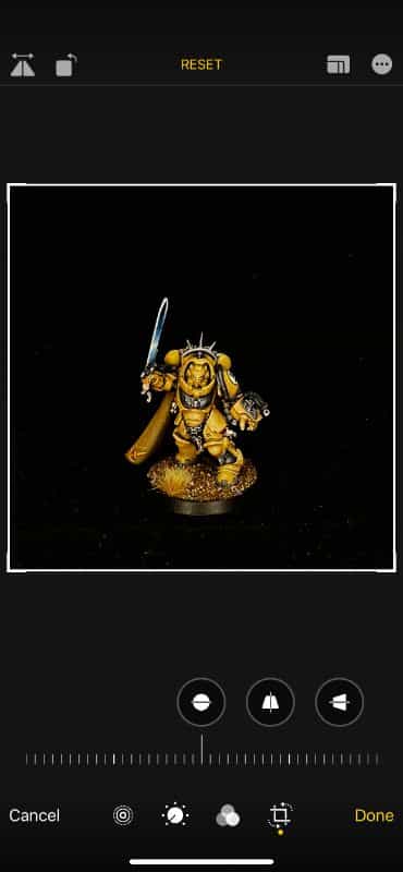 How to Photograph Miniatures with a Black Background (Guide) - how to capture miniature photos with pure black backdrops - infinite black backgrounds in miniature and model photography - guide for pure black background miniature photography - iphone editing