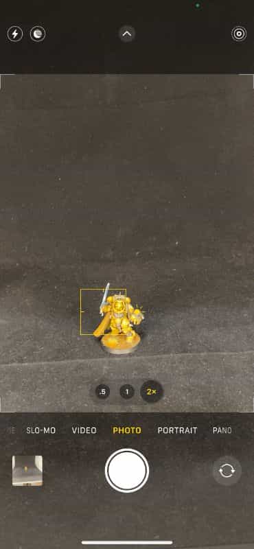 How to Photograph Miniatures with a Black Background (Guide) - how to capture miniature photos with pure black backdrops - infinite black backgrounds in miniature and model photography - guide for pure black background miniature photography - iphone miniature photography