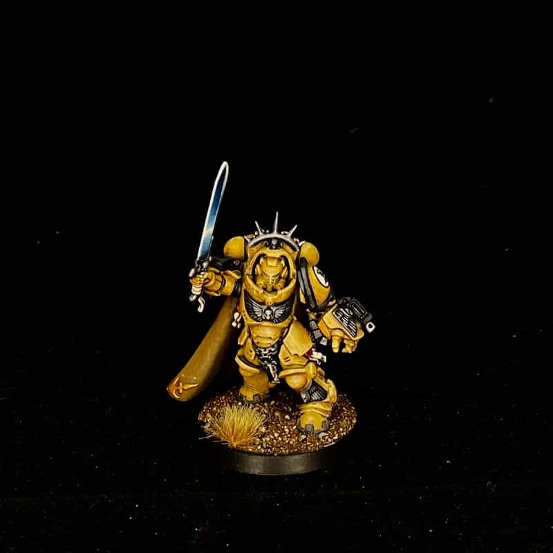 How to Photograph Miniatures with a Black Background (Guide) - how to capture miniature photos with pure black backdrops - infinite black backgrounds in miniature and model photography - guide for pure black background miniature photography - final image from smartphone iphone photography camera