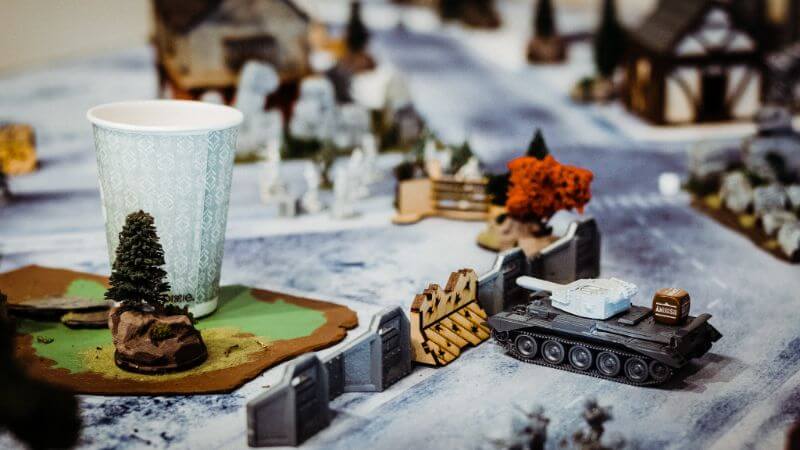 How Tabletop Miniature Gaming Can Help with PTSD - PTSD and tabletop games - wargames and PTSD - the benefits of tabletop games and boardgames for PTSD sufferers - a tank in a historical military tabletop miniature game, bolt action and konflikt 
