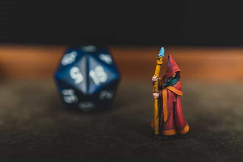How popular is tabletop miniature wargaming - is tabletop wargames popular and maintream - pathfinder reaper miniature mage painted red staff and d20