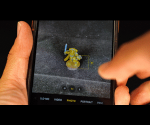 How to Photograph Miniatures with a Black Background (Guide) - how to capture miniature photos with pure black backdrops - infinite black backgrounds in miniature and model photography - guide for pure black background miniature photography - animation of exposure lock