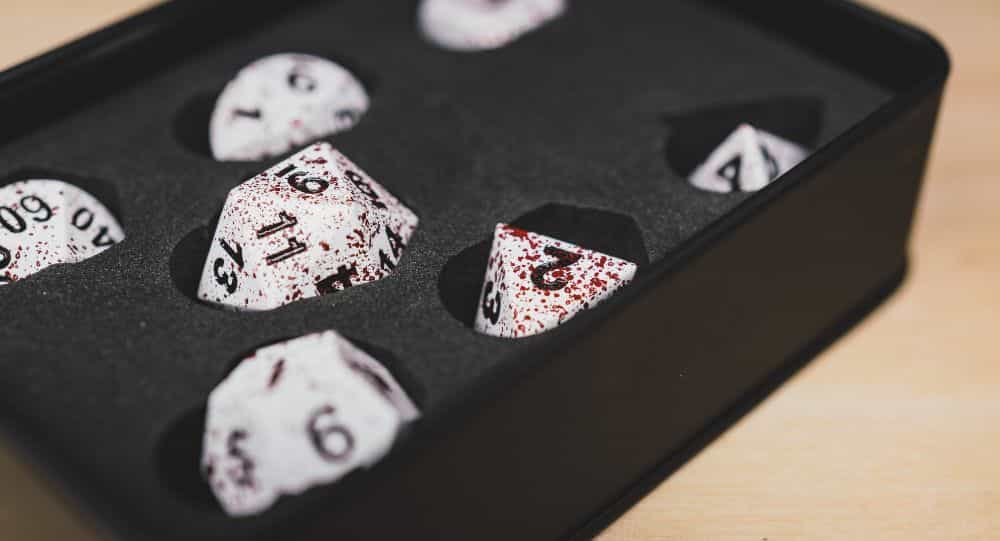 Best Metal Dice Sets? Forged Gaming Dice Sets for DnD and RPGs (Review) - metal dice set review - dice in foam